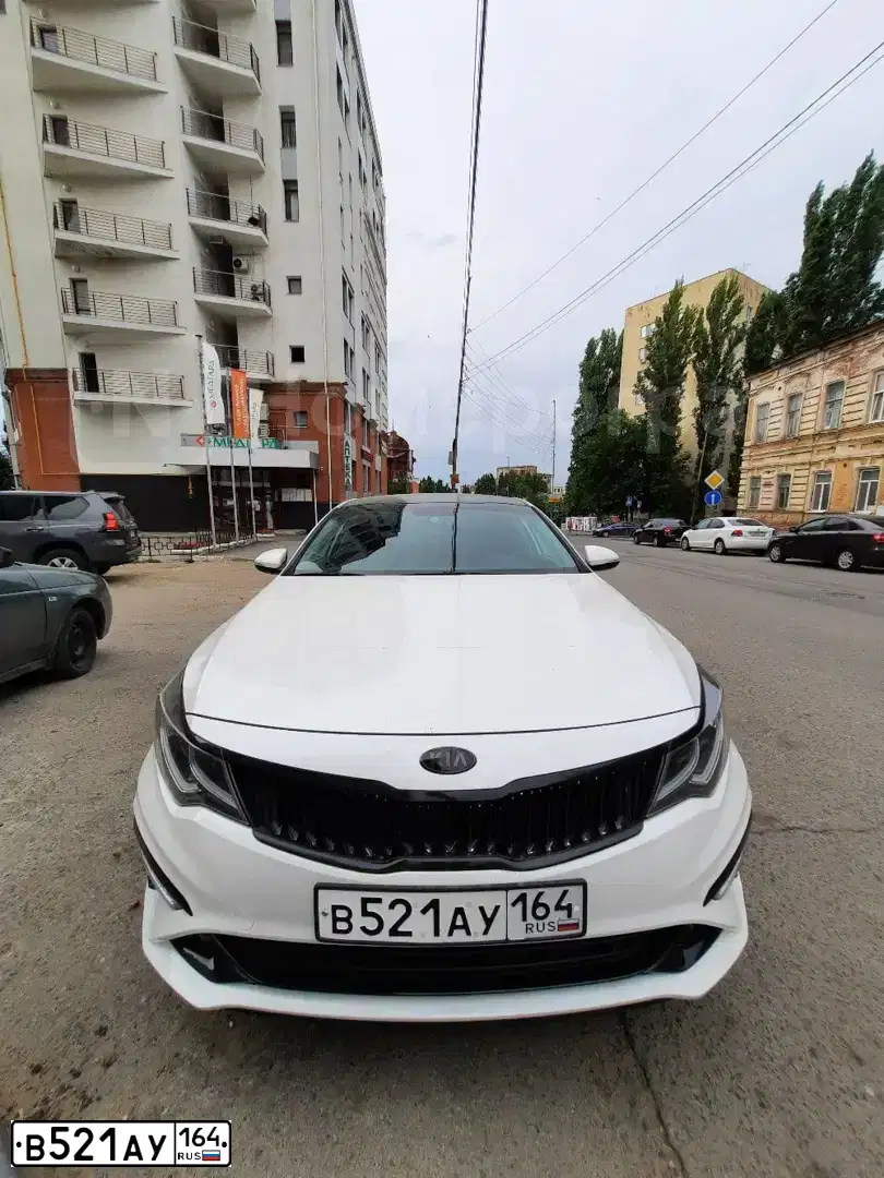 Фото автомобиля KIA MAGENTIS / OPTIMA, 2018 — госномер В521АУ164. Цвет: Белый