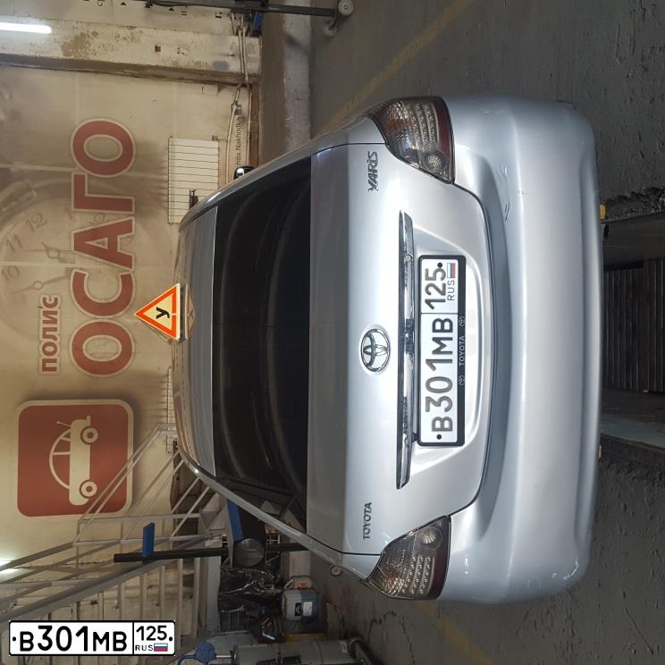 Фото автомобиля TOYOTA YARIS, 2009 — госномер В301МВ125. Цвет: Серый