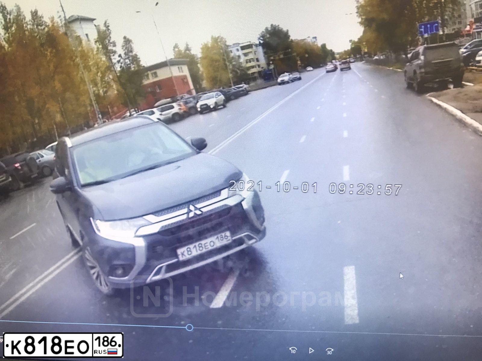 Фото автомобиля MITSUBISHI OUTLANDER, 2019 — госномер К818ЕО186. Цвет: Серый