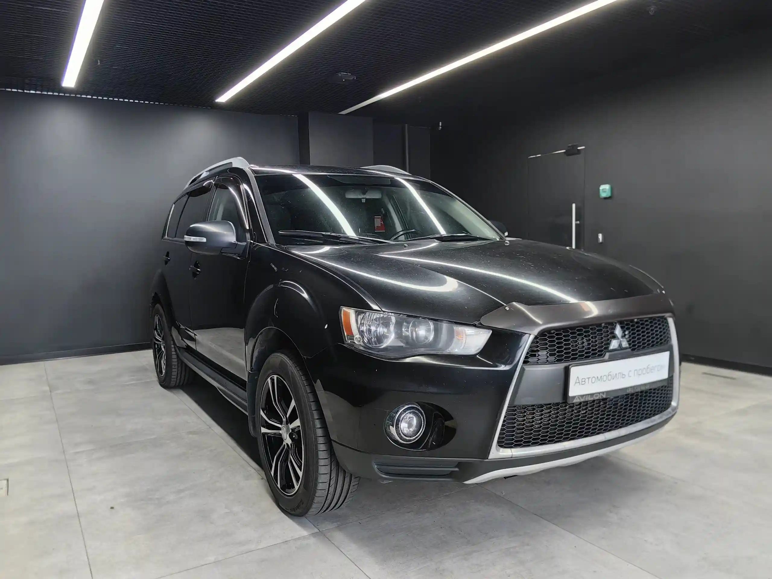 Фото автомобиля MITSUBISHI OUTLANDER, 2010 — госномер Н660ЕВ197. Цвет: ЧЕРНЫЙ