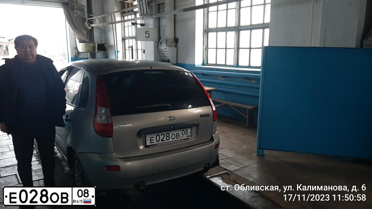 Фото автомобиля LADA 1119 KALINA, 2007 — госномер Е028ОВ08. Цвет: БЕЖЕВО-СЕРЫЙ