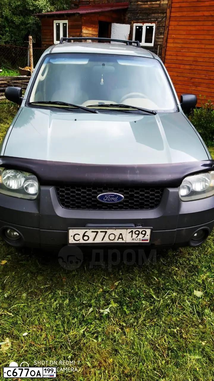Фото автомобиля FORD ESCAPE, 2005 — госномер О660УА05. Цвет: светло серо-зеленый металлик