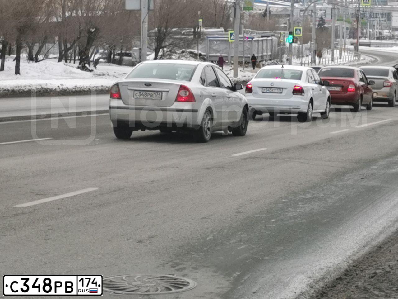 Фото автомобиля FORD FOCUS, 2006 — госномер С348РВ174. Цвет: Серебристый
