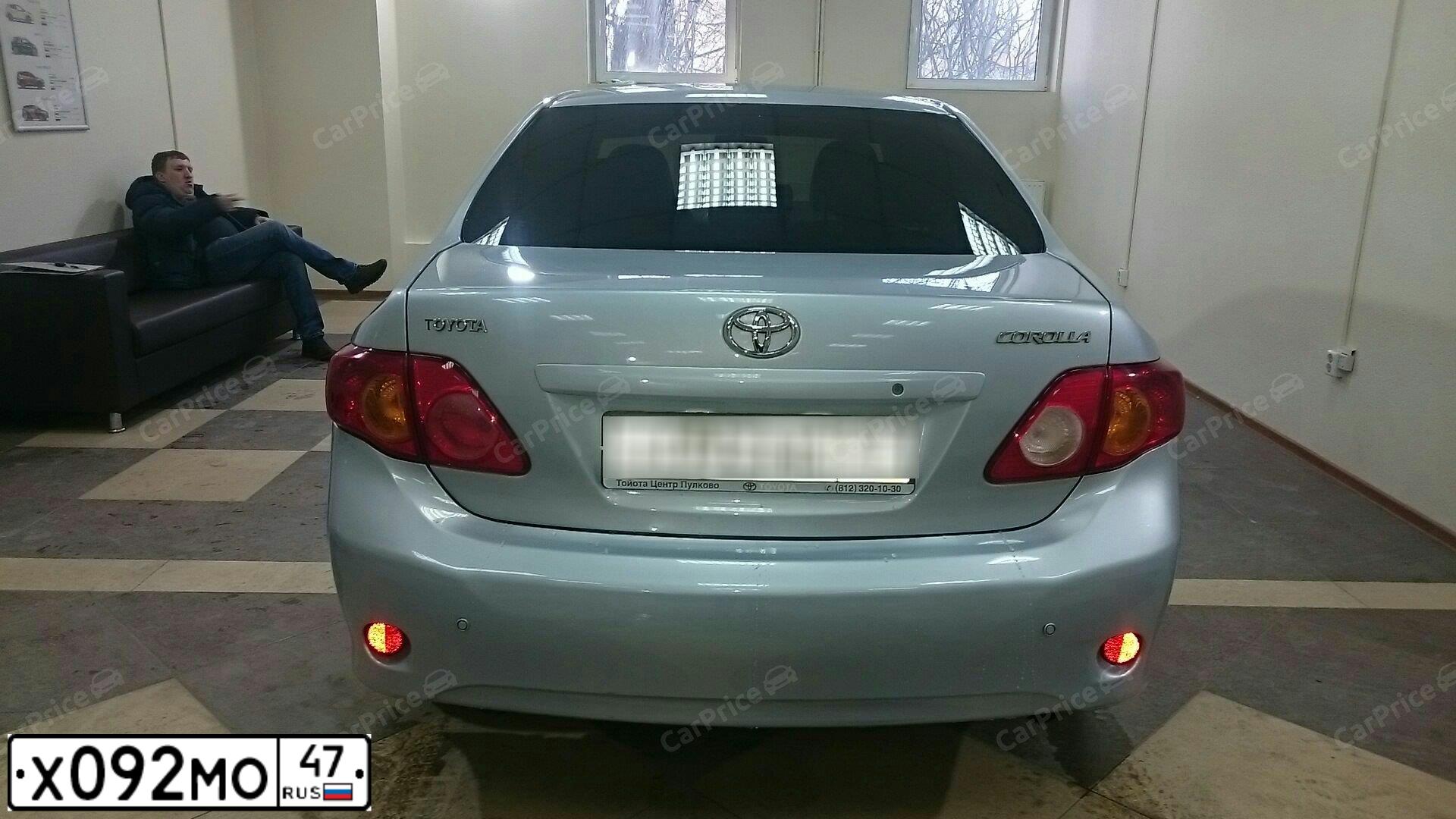 Фото автомобиля TOYOTA COROLLA, 2007 — госномер Х092МО47. Цвет: СВЕТЛО-ГОЛУБОЙ