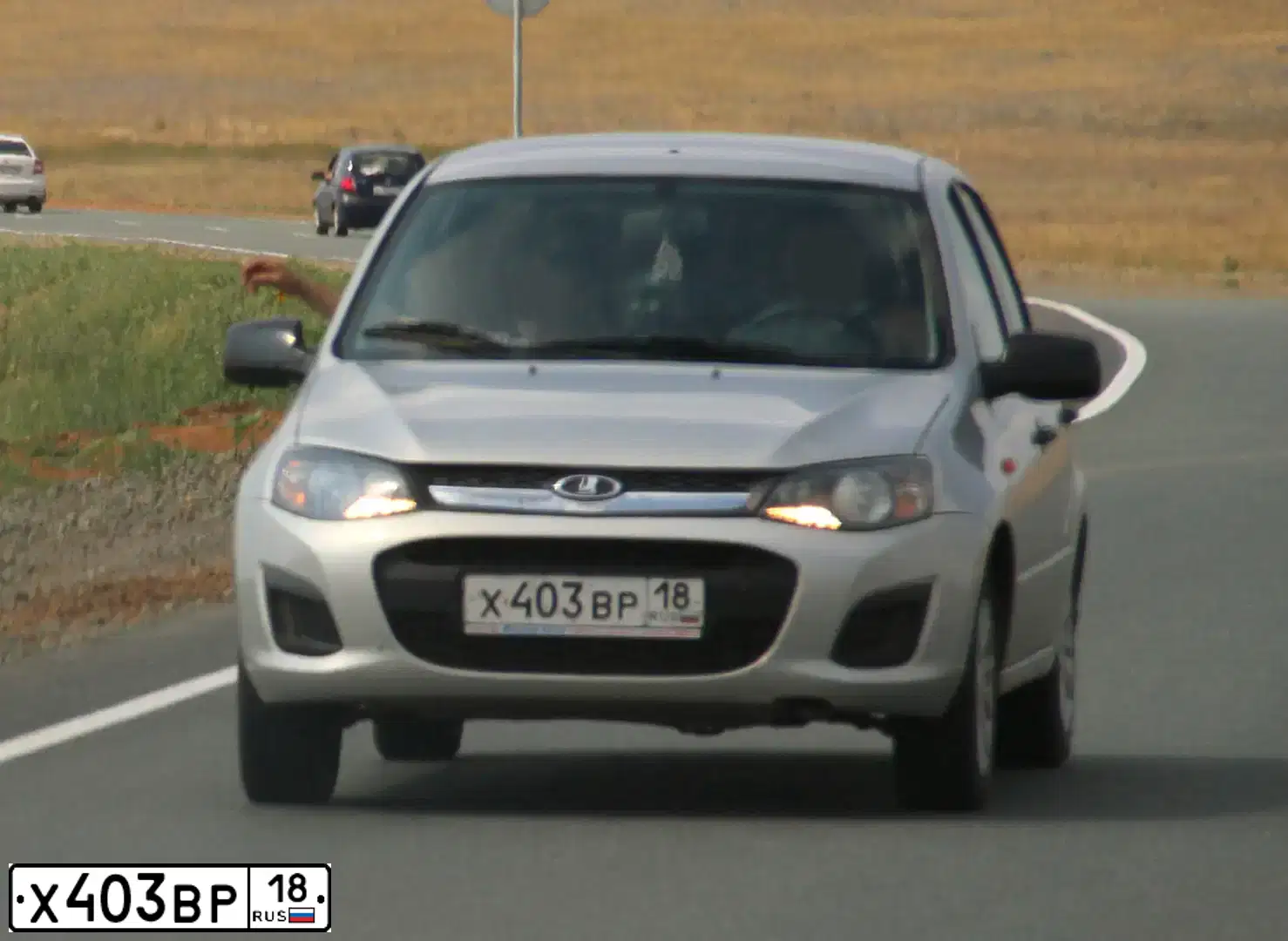Фото автомобиля LADA KALINA, 2014 — госномер М772КУ18. Цвет: СЕРЕБРИСТЫЙ