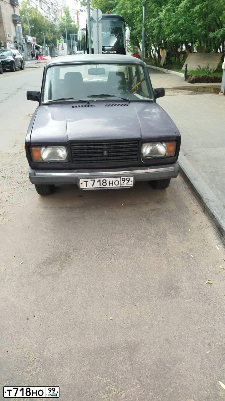 Фото автомобиля LADA 2107, 2000 — госномер Т718НО99. Цвет: ФИОЛЕТОВЫЙ