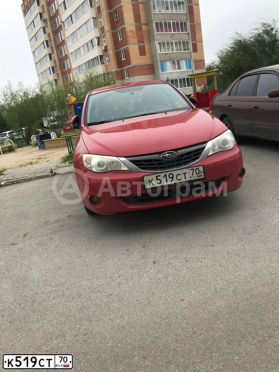 Фото автомобиля SUBARU IMPREZA, 2008 — госномер Т028ТТ24. Цвет: КРАСНЫЙ