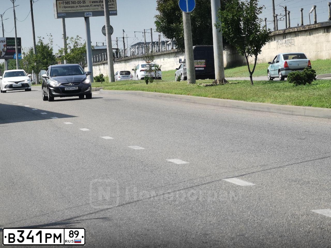 Фото автомобиля HYUNDAI SOLARIS, 2012 — госномер В341РМ89. Цвет: ЧЕРНО-СЕРЫЙ