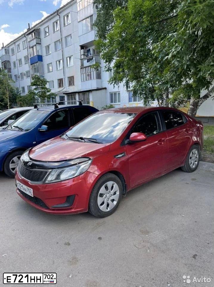 Фото автомобиля KIA RIO, 2013 — госномер Е188РВ702