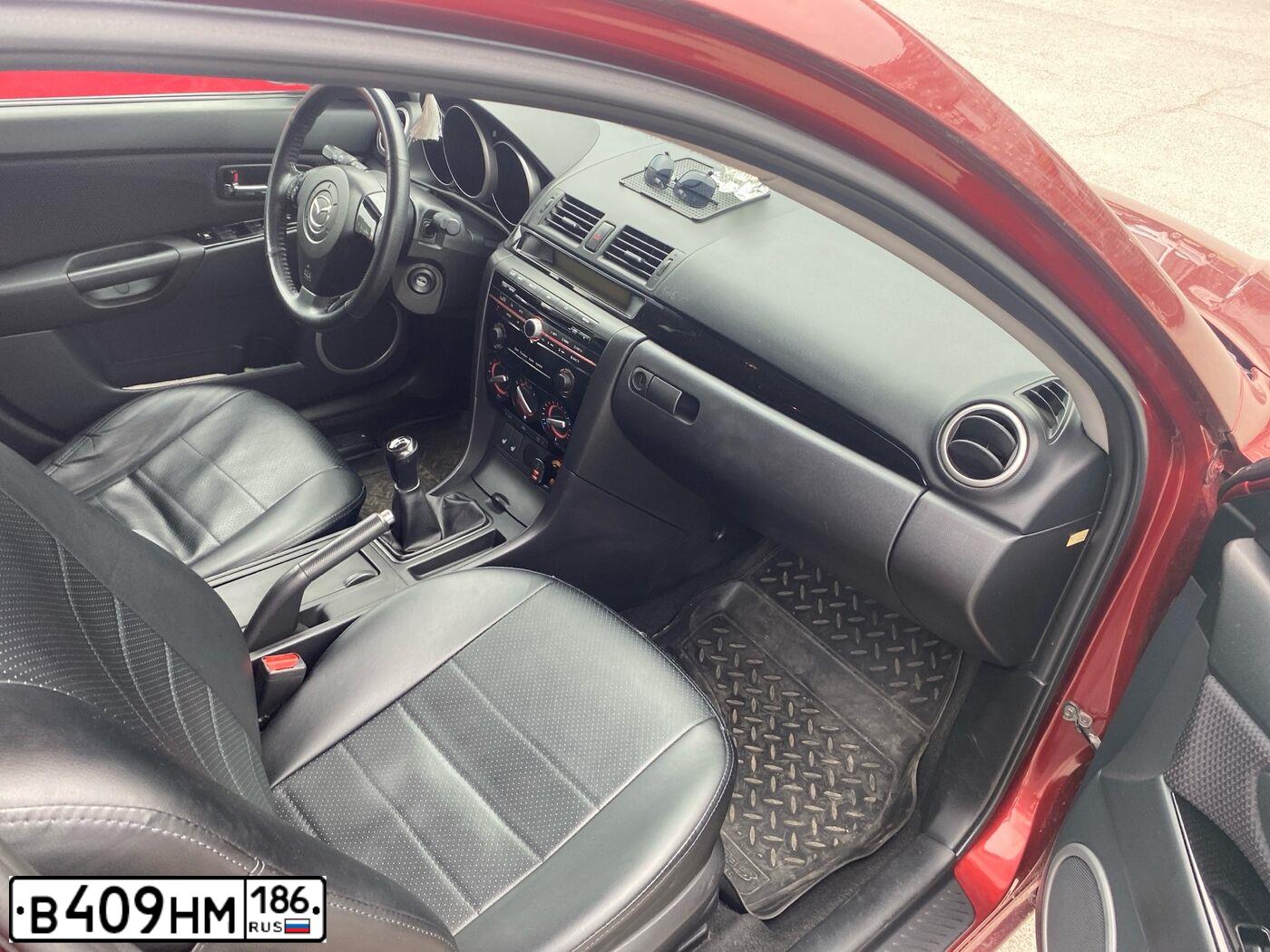 Фото автомобиля MAZDA 3, 2008 — госномер Р477МТ186. Цвет: Красный