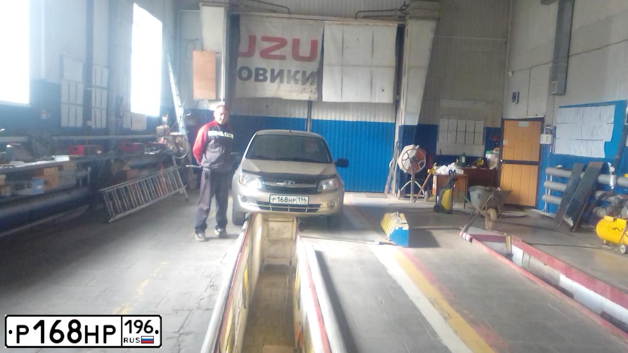 Фото автомобиля LADA 2190 GRANTA, 2013 — госномер Н573ВА774. Цвет: БЕЖЕВЫЙ