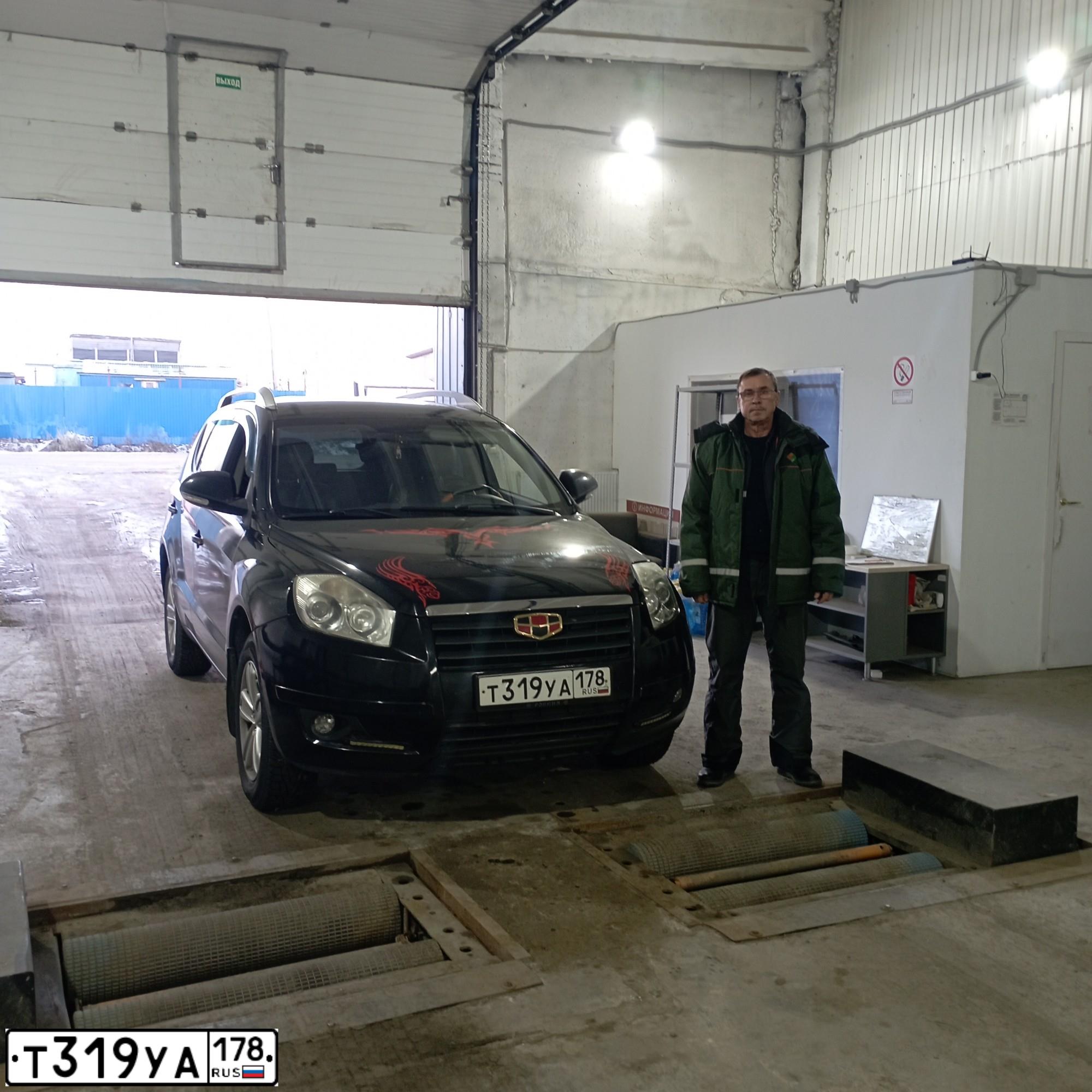 Фото автомобиля GEELY EMGRAND X7, 2015 — госномер С245КТ198. Цвет: ЧЕРНЫЙ
