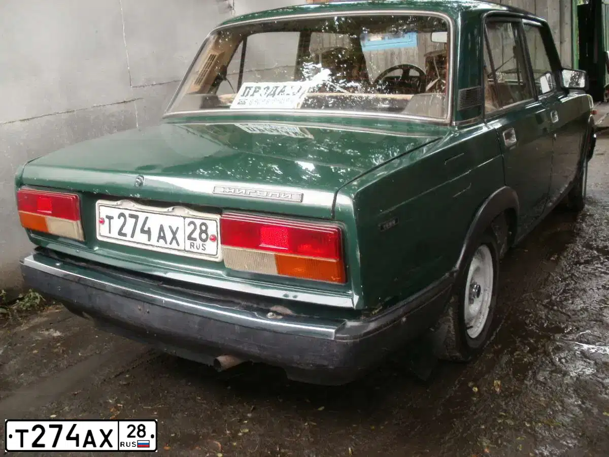 Фото автомобиля LADA 2107, 1998 — госномер В984ХК28. Цвет: ЗЕЛЕНЫЙ