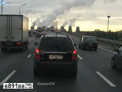 Фото автомобиля BMW X5, 2005 — госномер Т242УС790. Цвет: ЧЕРНЫЙ