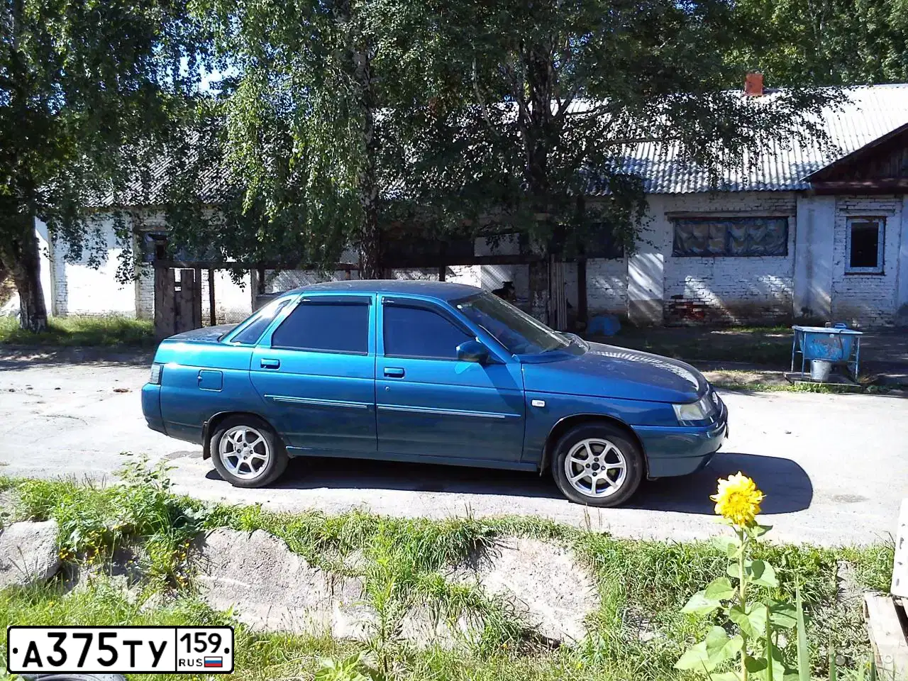 Фото автомобиля LADA 2110, 2005 — госномер Е715ХО159. Цвет: ЧЕРНЫЙ