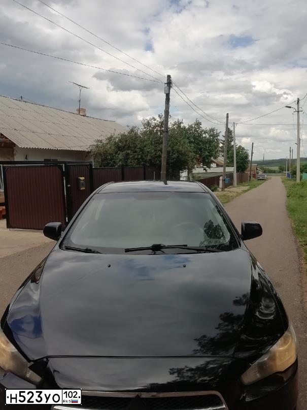 Фото автомобиля MITSUBISHI LANCER, 2007 — госномер В131МР156. Цвет: ЧЕРНЫЙ