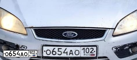 Фото автомобиля FORD FOCUS, 2006 — госномер Н694ОС702. Цвет: Серебристый