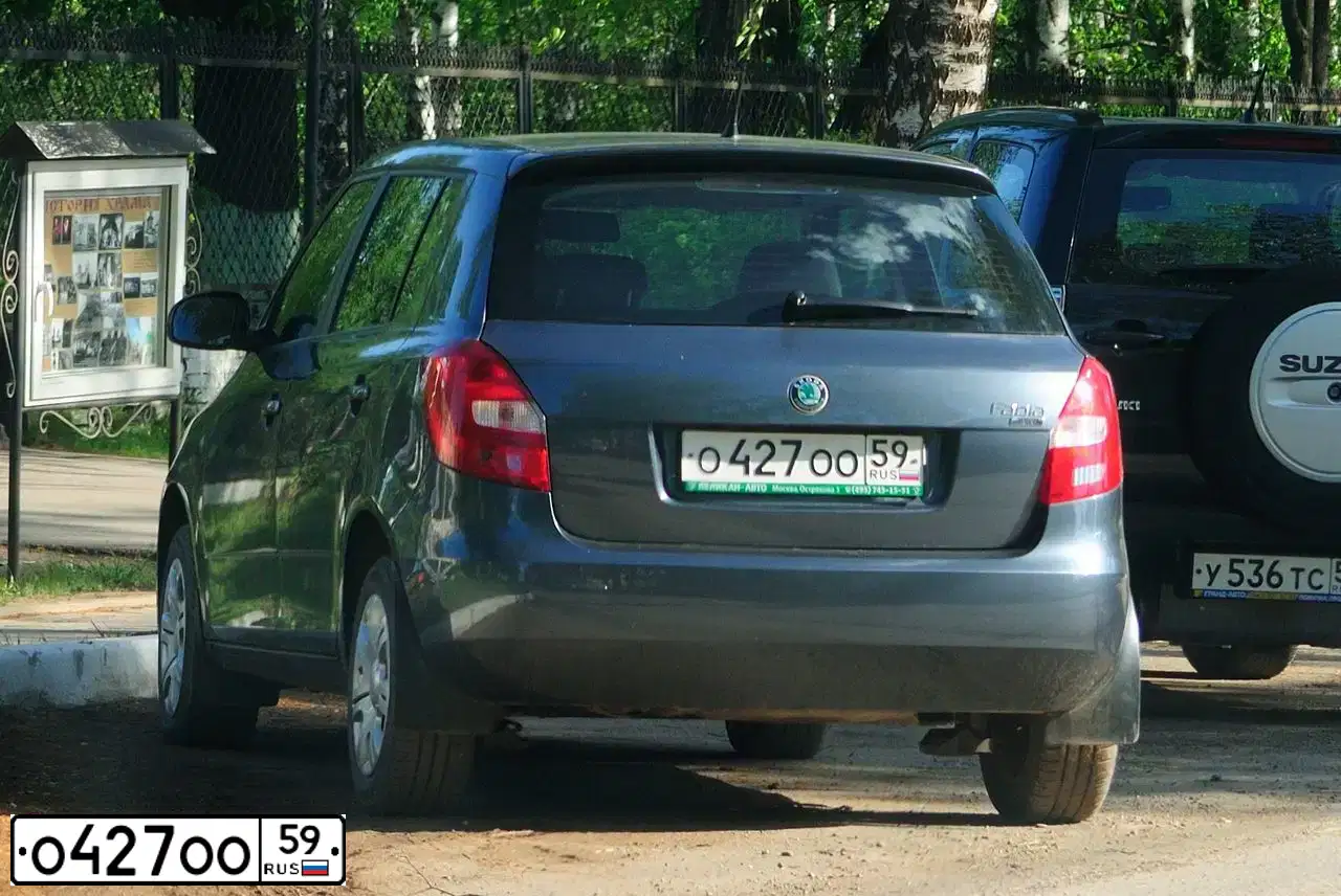 Фото автомобиля LADA 1117 KALINA, 2010 — госномер О427ОО59. Цвет: ЧЕРНЫЙ