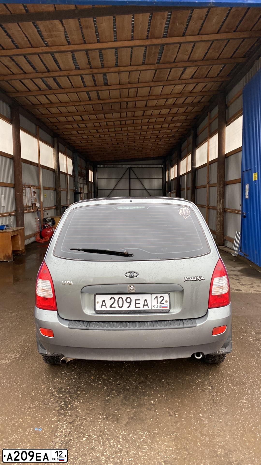Фото автомобиля LADA 1117 KALINA, 2010 — госномер А209ЕА12. Цвет: ТЕМНО-СЕРЫЙ МЕТАЛЛИК