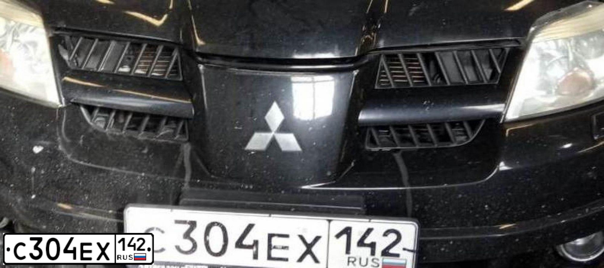 Фото автомобиля MITSUBISHI OUTLANDER, 2006 — госномер К547ТН154. Цвет: ЧЕРНЫЙ