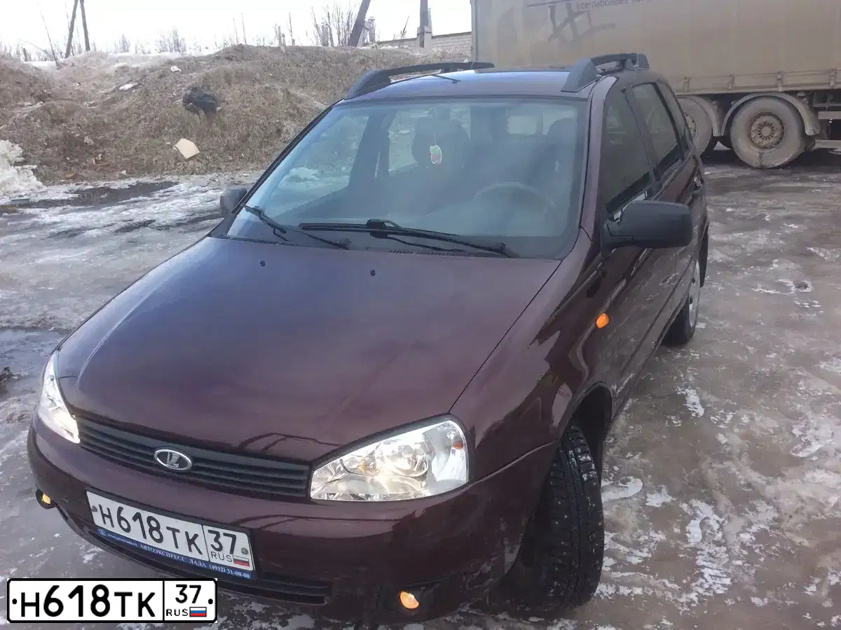 Фото автомобиля LADA 1117 KALINA, 2012 — госномер Н618ТК37. Цвет: ТЕМНО-ВИШНЕВЫЙ