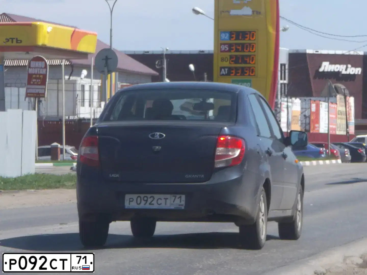 Фото автомобиля LADA 2190 GRANTA, 2013 — госномер Р092СТ71. Цвет: СЕРО-СИНИЙ