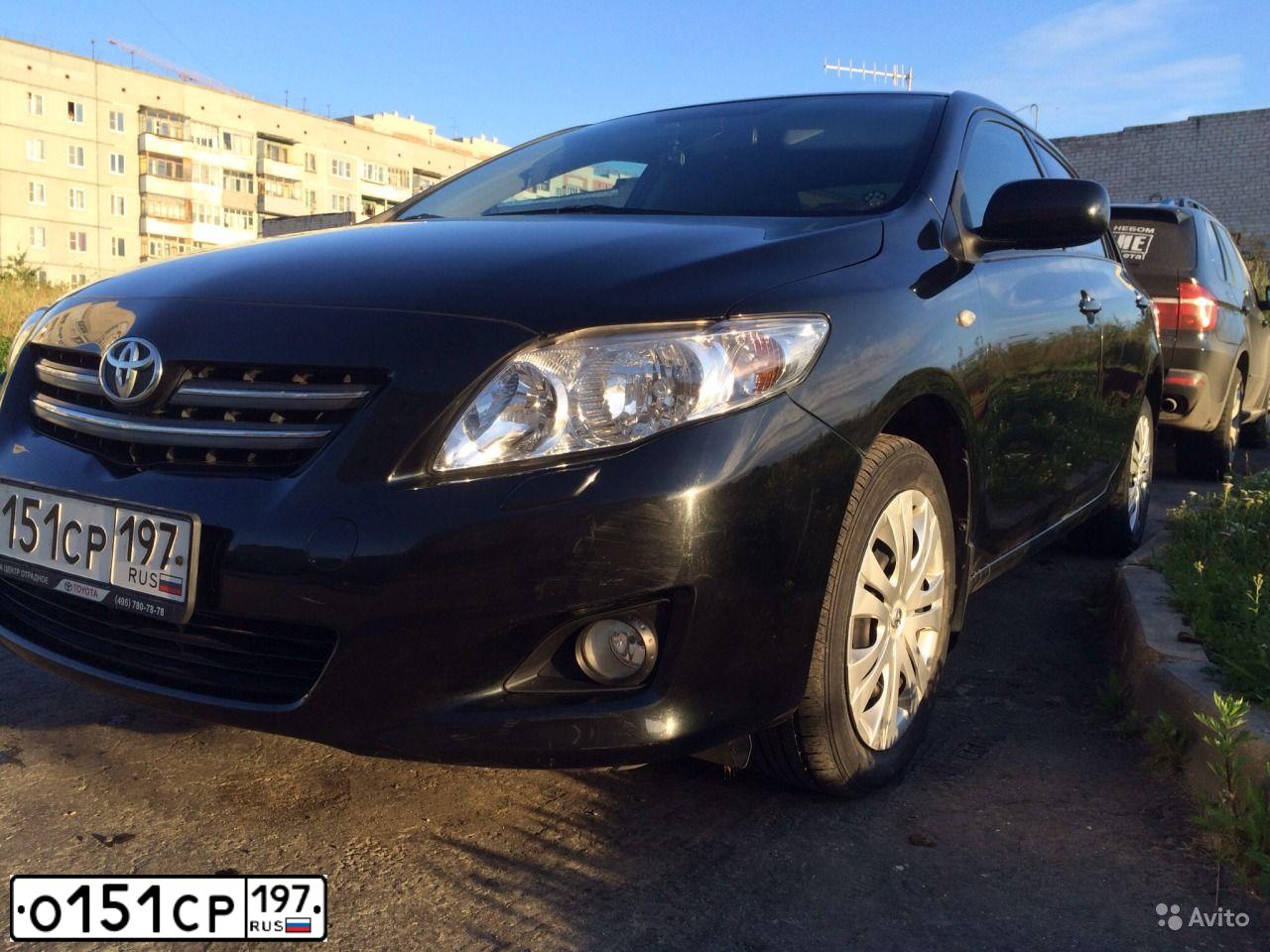 Фото автомобиля TOYOTA COROLLA, 2007 — госномер К114НЕ35. Цвет: ЧЕРНЫЙ