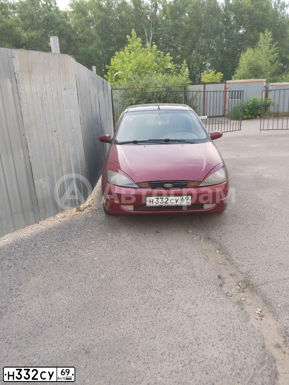 Фото автомобиля FORD FOCUS, 2000 — госномер Т113УВ69. Цвет: ВИШНЕВЫЙ