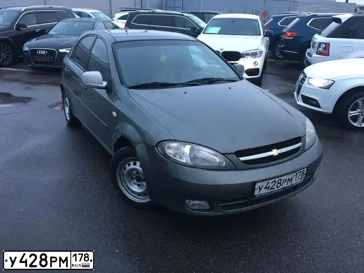 Фото автомобиля CHEVROLET LACETTI, 2010 — госномер А213ТУ252. Цвет: Серый