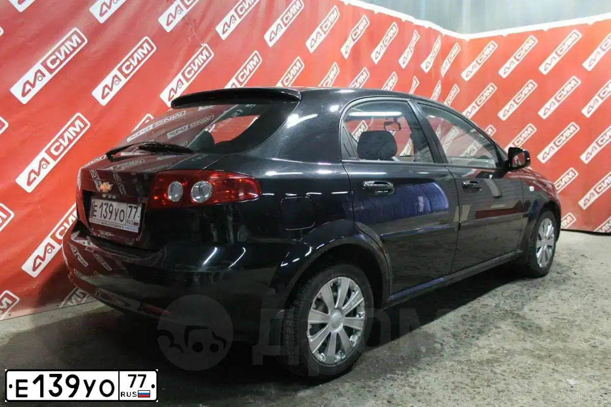 Фото автомобиля CHEVROLET LACETTI, 2011 — госномер Р729ВМ62. Цвет: ЧЕРНЫЙ