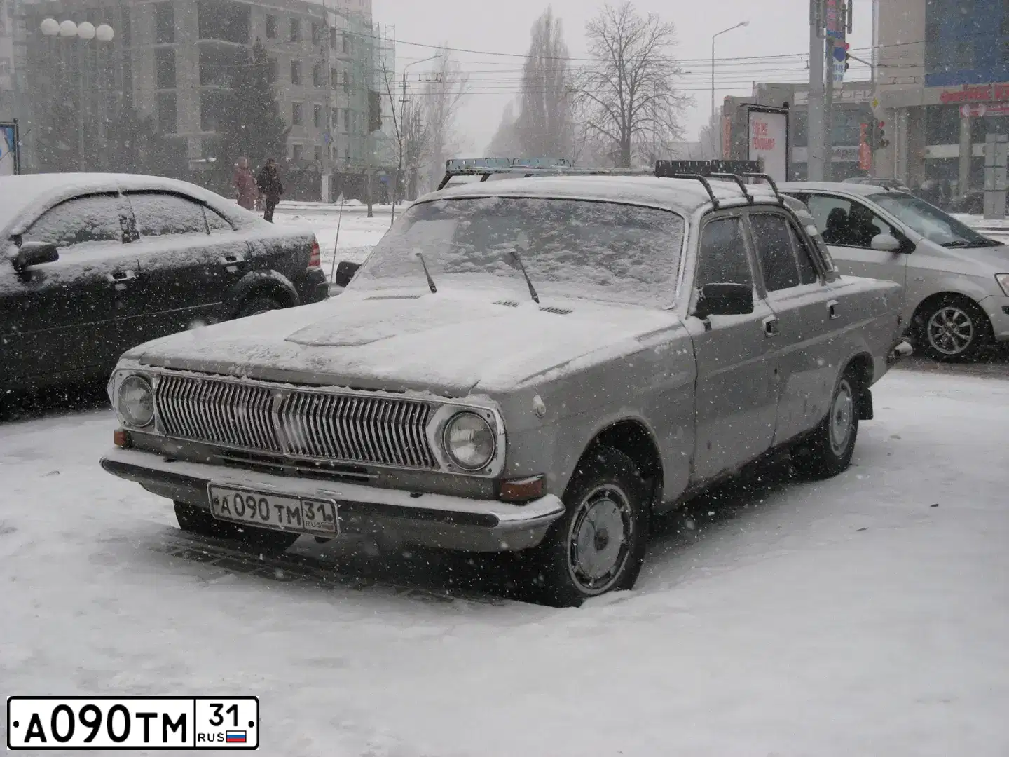 Фото автомобиля GAZ 24 WOLGA, 1992 — госномер А090ТМ31. Цвет: СЕРЫЙ