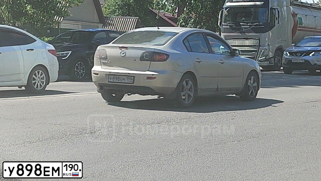Фото автомобиля MAZDA 3, 2006 — госномер У404ТА152. Цвет: БЕЖЕВЫЙ