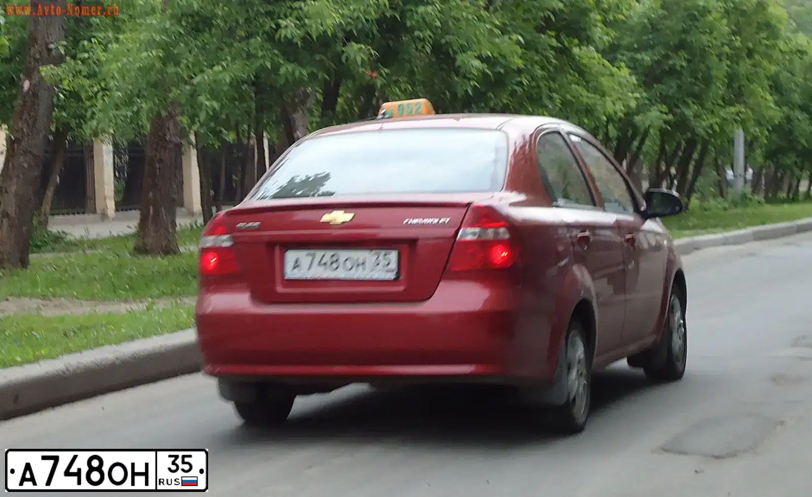 Фото автомобиля CHEVROLET AVEO, 2008 — госномер А748ОН35. Цвет: Красный