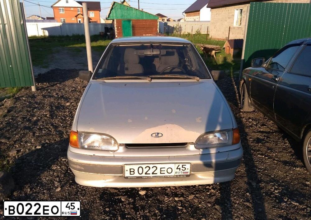 Фото автомобиля LADA 2115, 2004 — госномер Р599НМ72. Цвет: МОЛОЧНО-БЕЛЫЙ СЕРЕБРИСТЫЙ