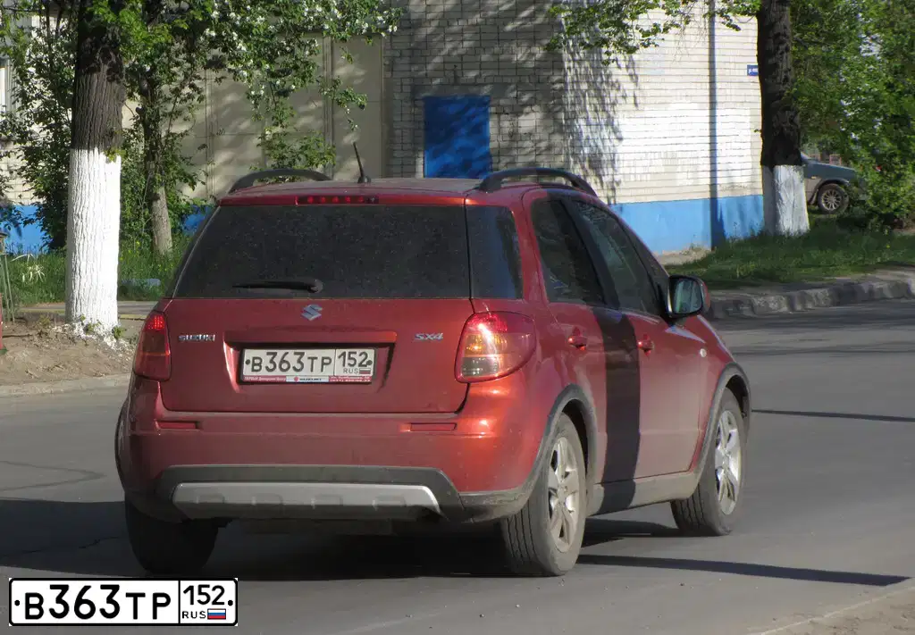 Фото автомобиля SUZUKI SX 4, 2010 — госномер Р089УЕ152. Цвет: Оранжевый