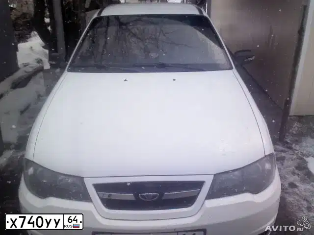 Фото автомобиля DAEWOO NEXIA, 2012 — госномер Х740УУ64. Цвет: БЕЛО ДЫМЧАТЫЙ