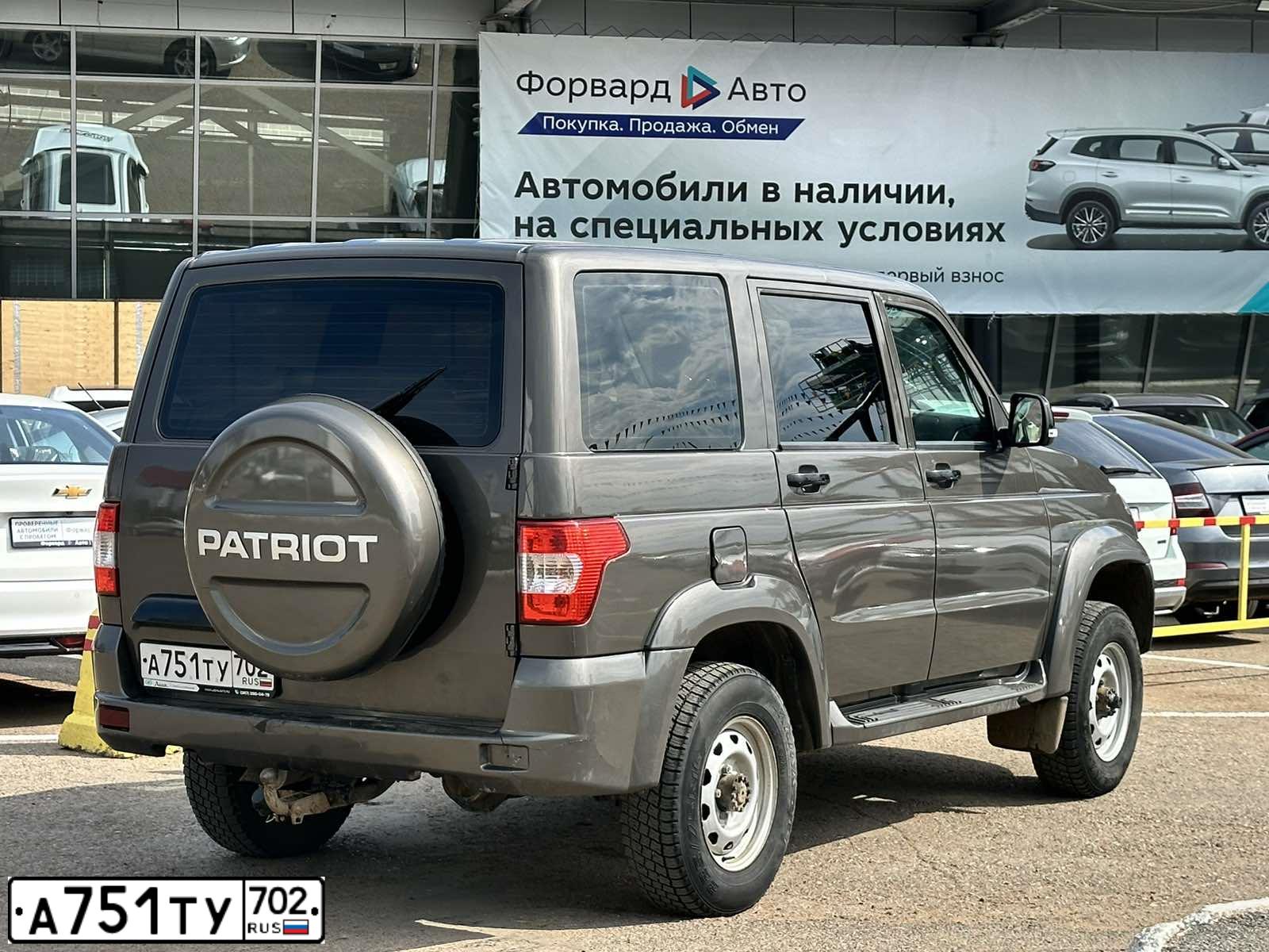 Фото автомобиля UAZ PATRIOT, 2020 — госномер М433МХ702. Цвет: Коричневый