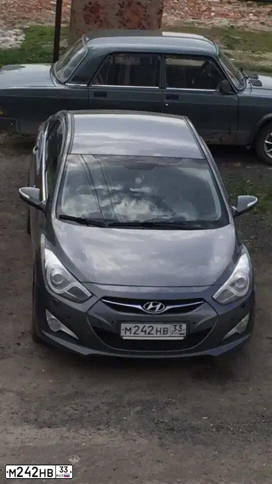 Фото автомобиля HYUNDAI I40, 2013 — госномер Х222СА22. Цвет: СЕРЫЙ