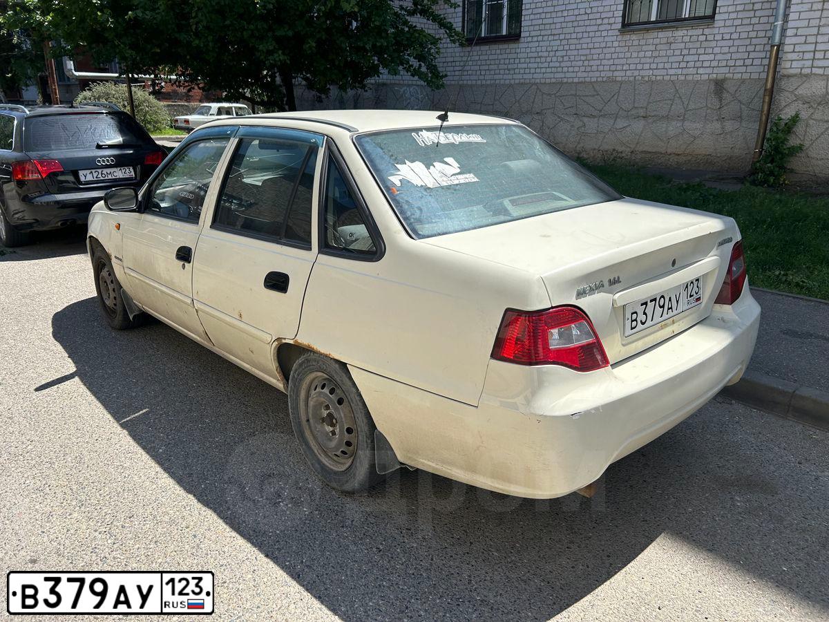 Фото автомобиля DAEWOO NEXIA, 2011 — госномер В641УМ01. Цвет: ТОПЛЕНОЕ МОЛОКО