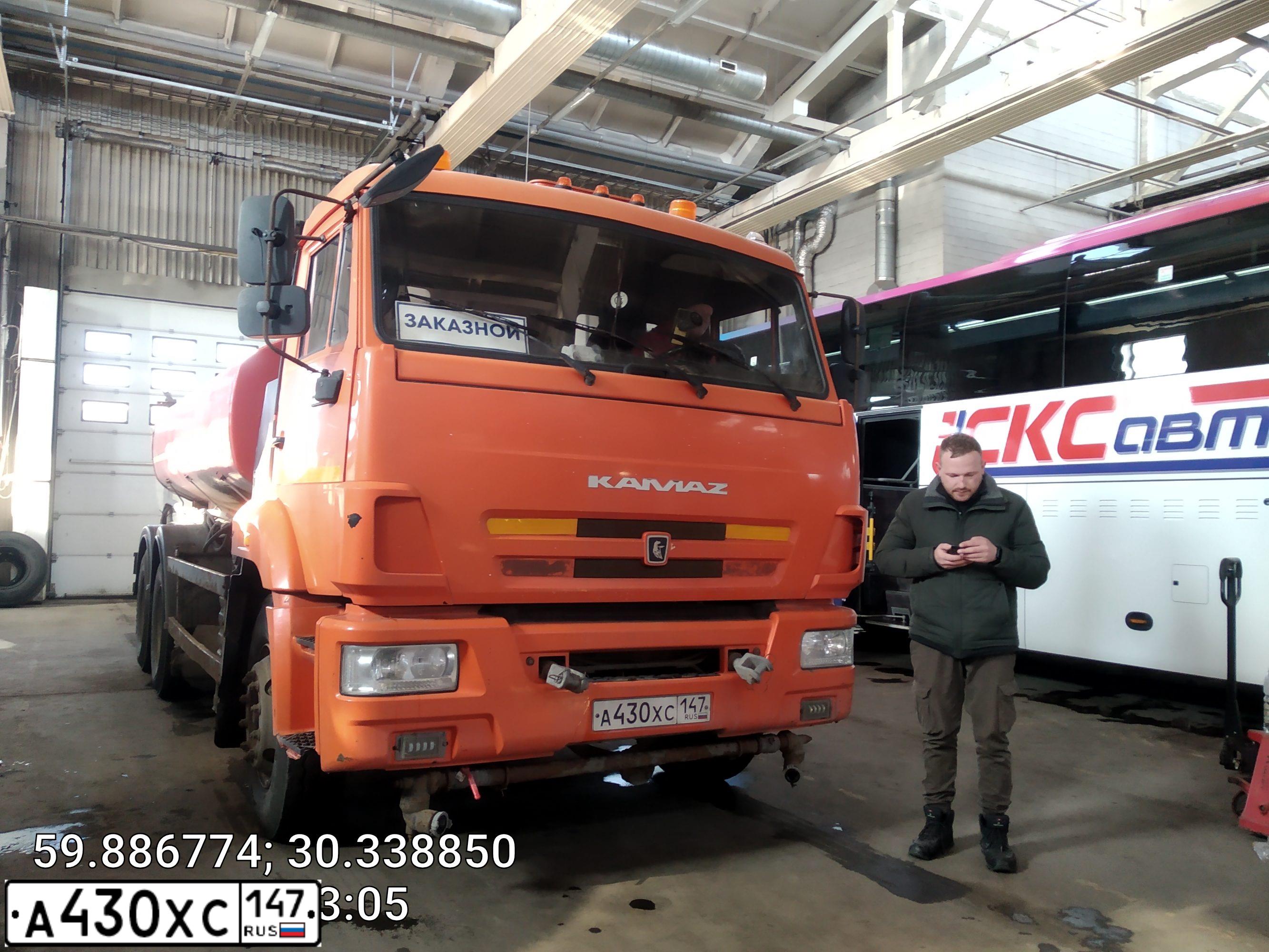 Фото автомобиля KAMAZ 65115 /6X4/, 2018 — госномер А430ХС147. Цвет: Оранжевый RAL 2009