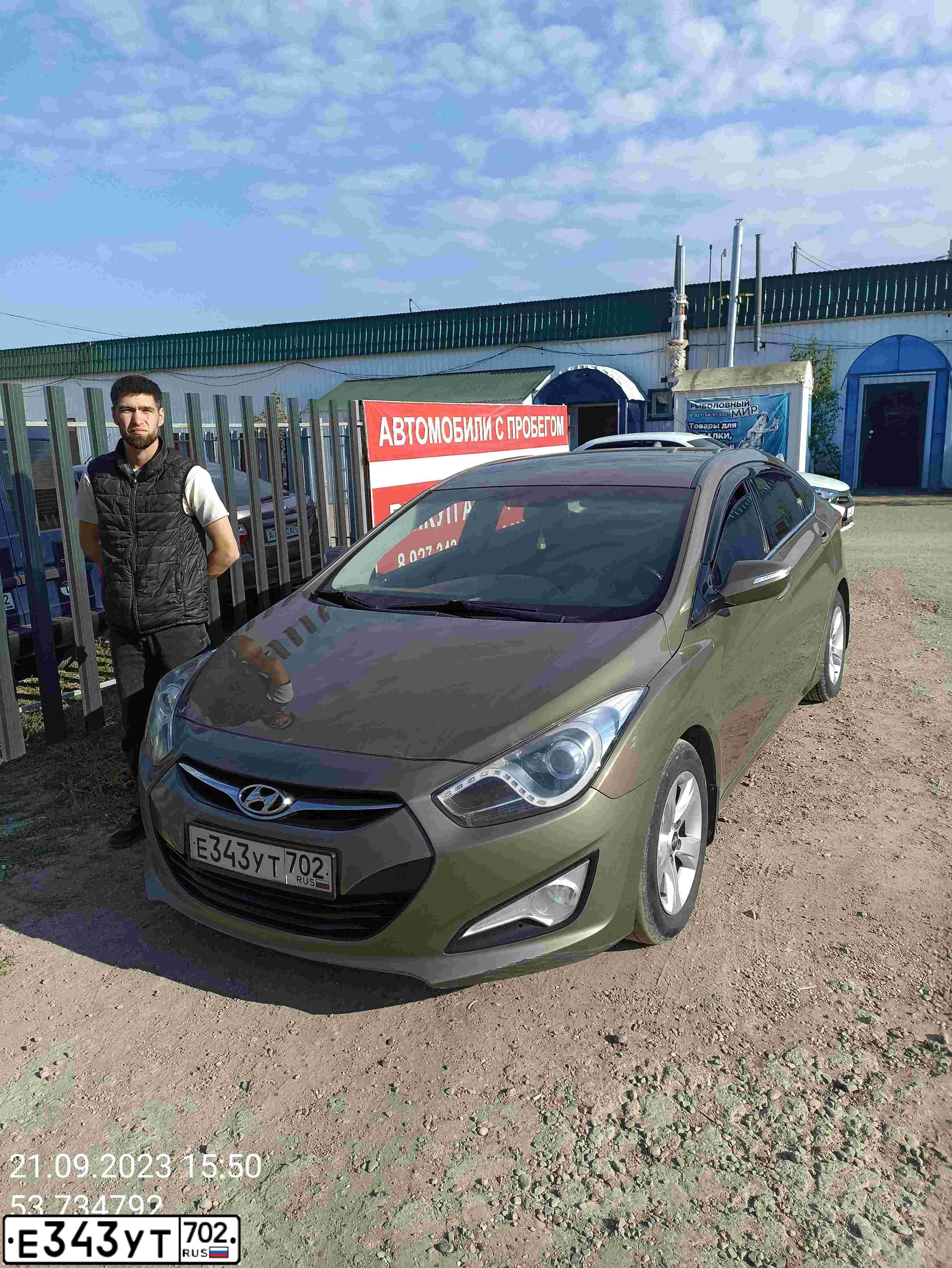 Фото автомобиля HYUNDAI I40, 2014 — госномер Е343УТ702. Цвет: БЕЖЕВЫЙ