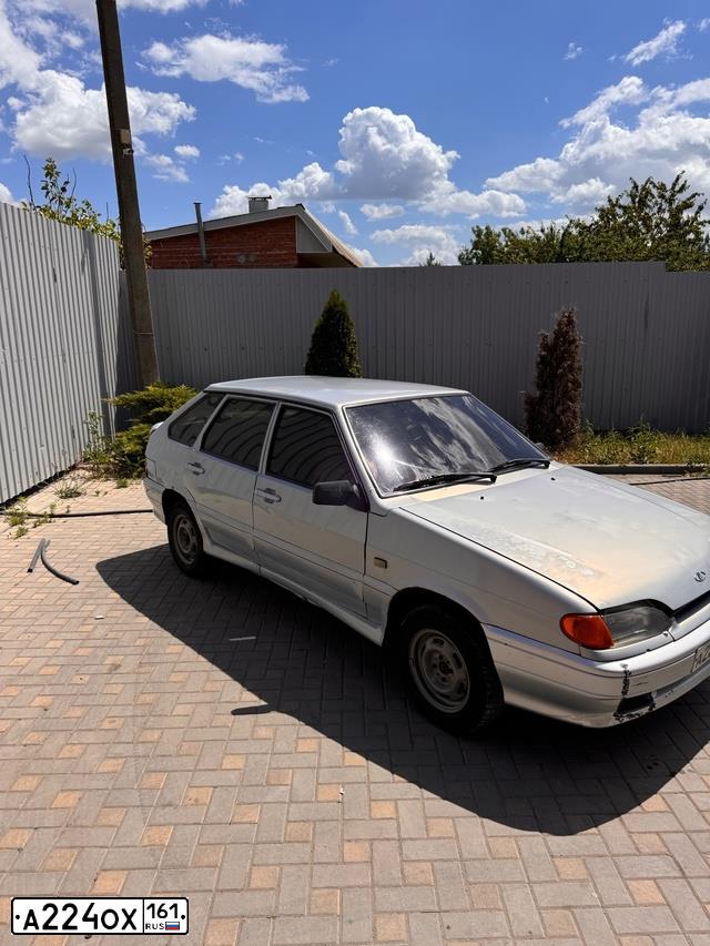 Фото автомобиля LADA 2114 SAMARA, 2006 — госномер А224ОХ161. Цвет: Серебристо-Желто-Голубой