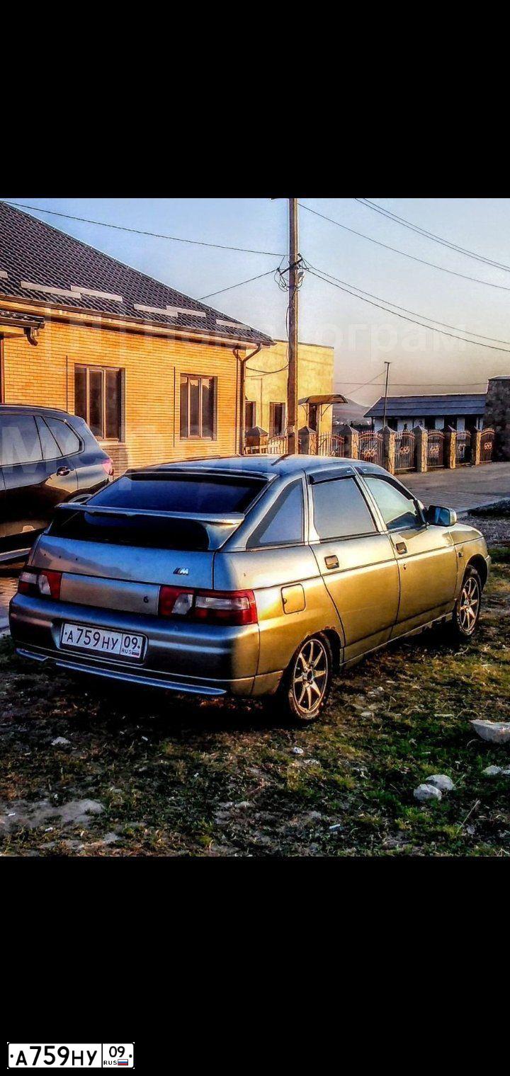 Фото автомобиля LADA 2112, 2005 — госномер А759НУ09. Цвет: СРЕДНИЙ СЕРО-ЗЕЛЕНЫЙ МЕТ
