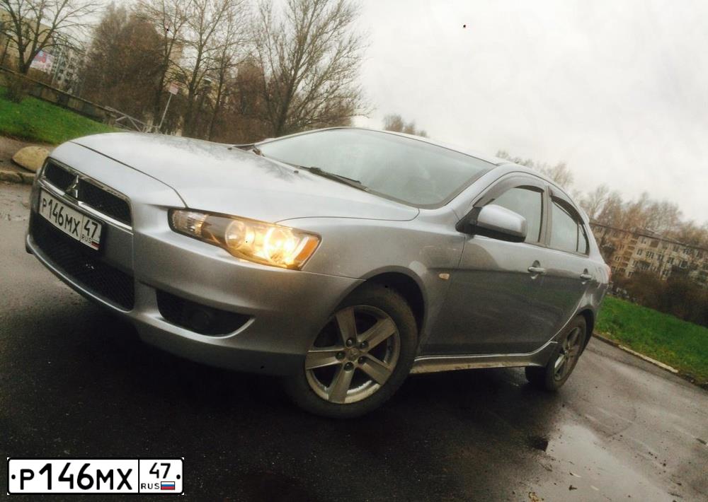 Фото автомобиля MITSUBISHI LANCER, 2008 — госномер Х404НН178. Цвет: серебристый