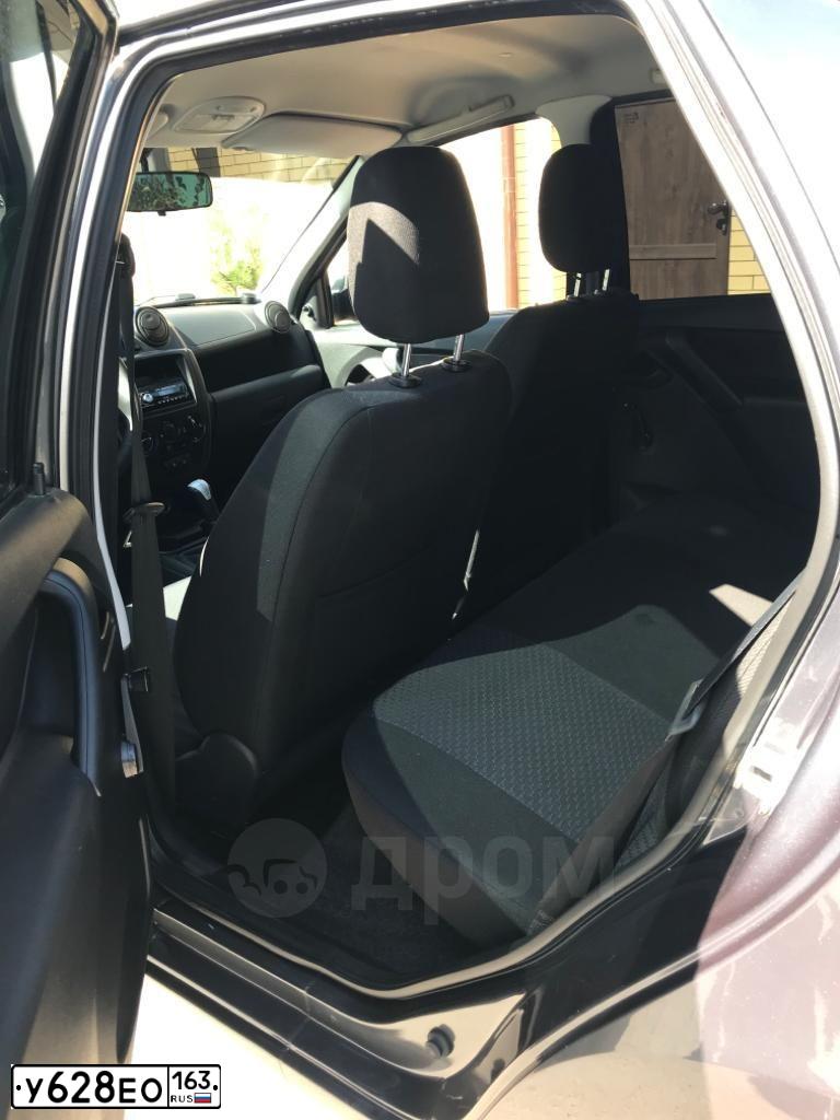 Фото автомобиля LADA 2190 GRANTA, 2014 — госномер М306АХ761. Цвет: серебристо-темно-серый