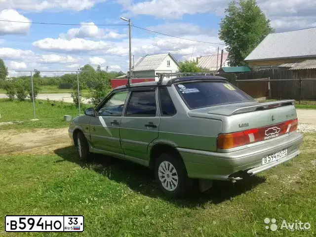 Фото автомобиля LADA 2115 SAMARA, 2006 — госномер В594НО33. Цвет: БЕЛО-ЗЕЛЕНЫЙ