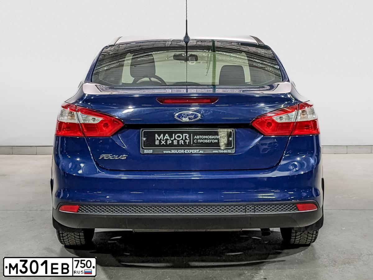 Фото автомобиля FORD FOCUS, 2013 — госномер М301ЕВ750. Цвет: Темно-синий