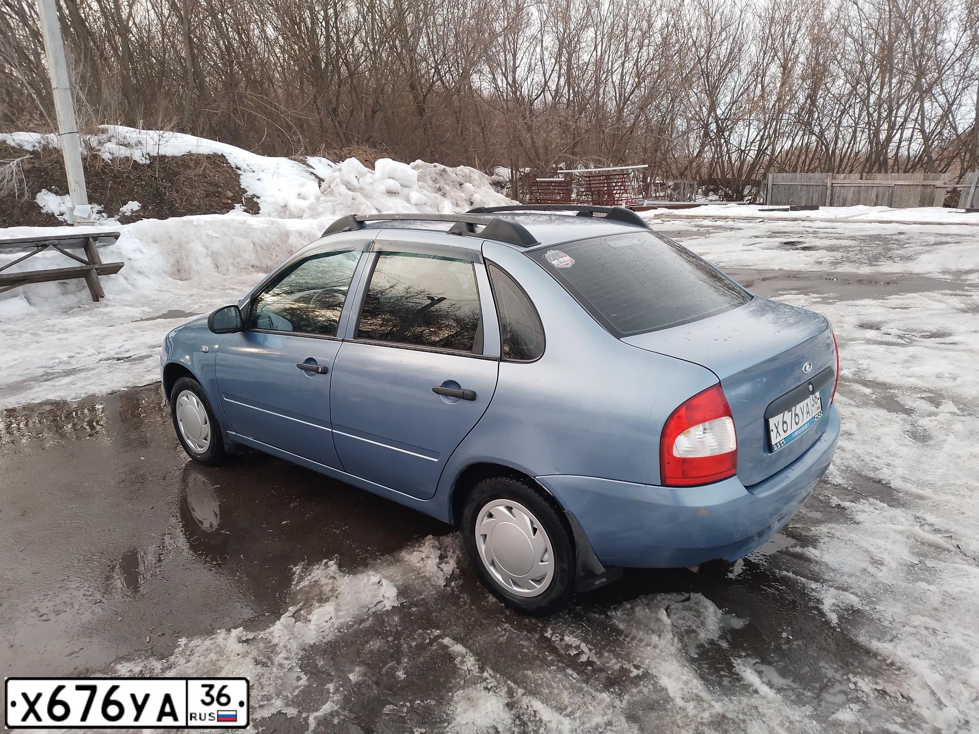 Фото автомобиля LADA 1118 KALINA, 2006 — госномер Х676УА36. Цвет: СЕРО-СИНИЙ