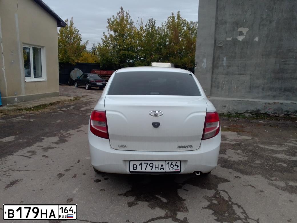 Фото автомобиля LADA 2190 GRANTA, 2013 — госномер В179НА164. Цвет: Белый