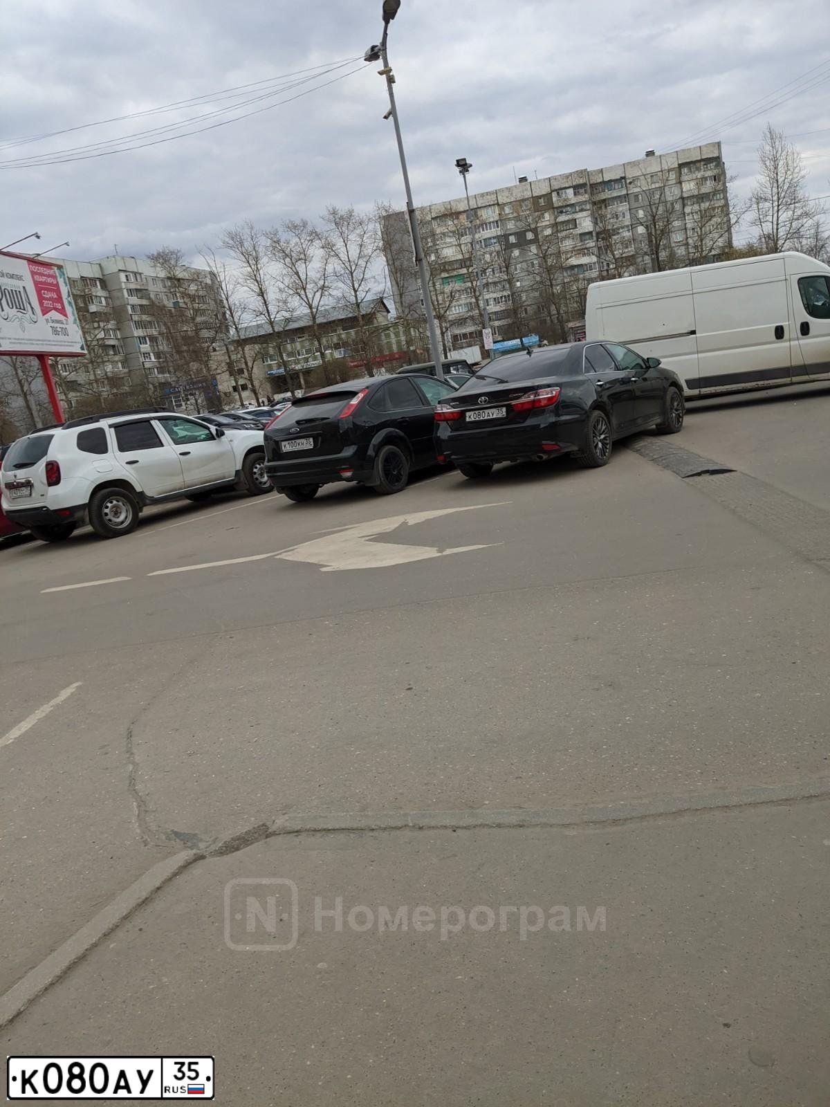 Фото автомобиля FORD D FOCUS, 2007 — госномер К100КН35. Цвет: ЧЕРНЫЙ